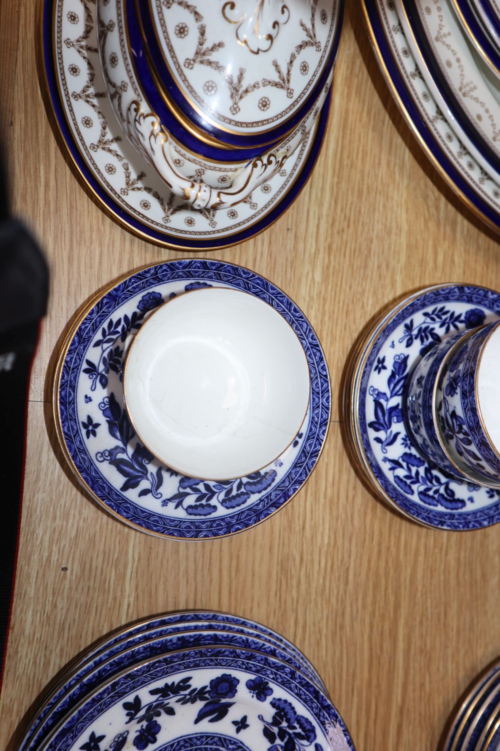 A collection of blue and white dinner ware and a Cauldon dinner service